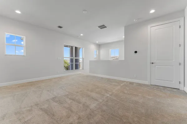 a view of a dining room with furniture wooden floor and chandelier