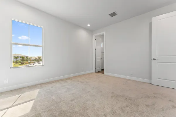 a room with furniture and wooden floor