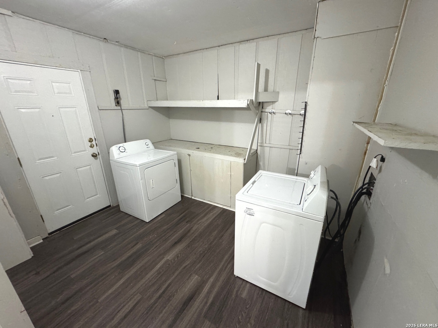 7300 Deep Spring Drive San Antonio, TX 78238 - Photo 3 of 9 a view of a storage and utility room with washer and dryer
