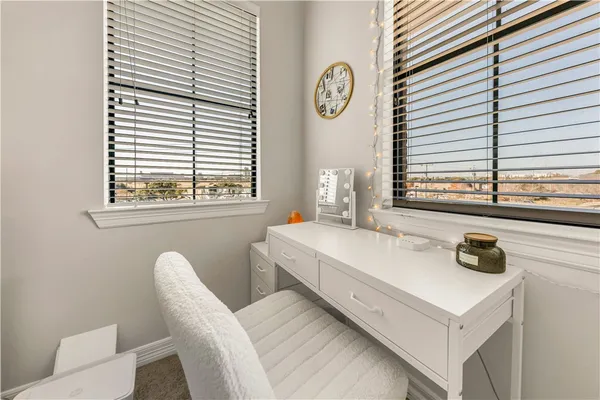 a bathroom with a sink and a window