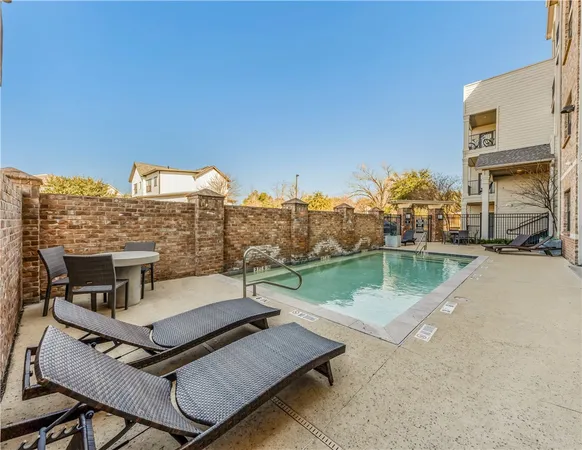 a view of a terrace with sitting area