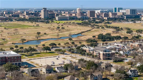a view of a city with an ocean view