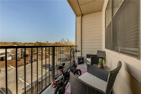 a view of balcony with a patio