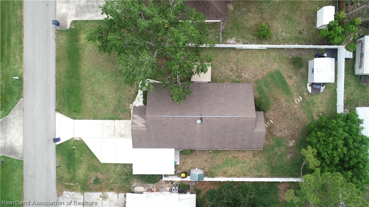113 Longview Road Sebring, FL 33870 - Photo 29 of 31 an aerial view of a house with a yard