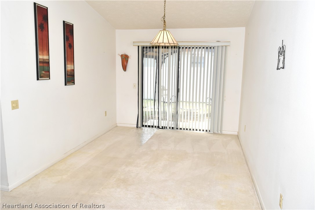 113 Longview Road Sebring, FL 33870 - Photo 8 of 31 a view of an empty room with a window