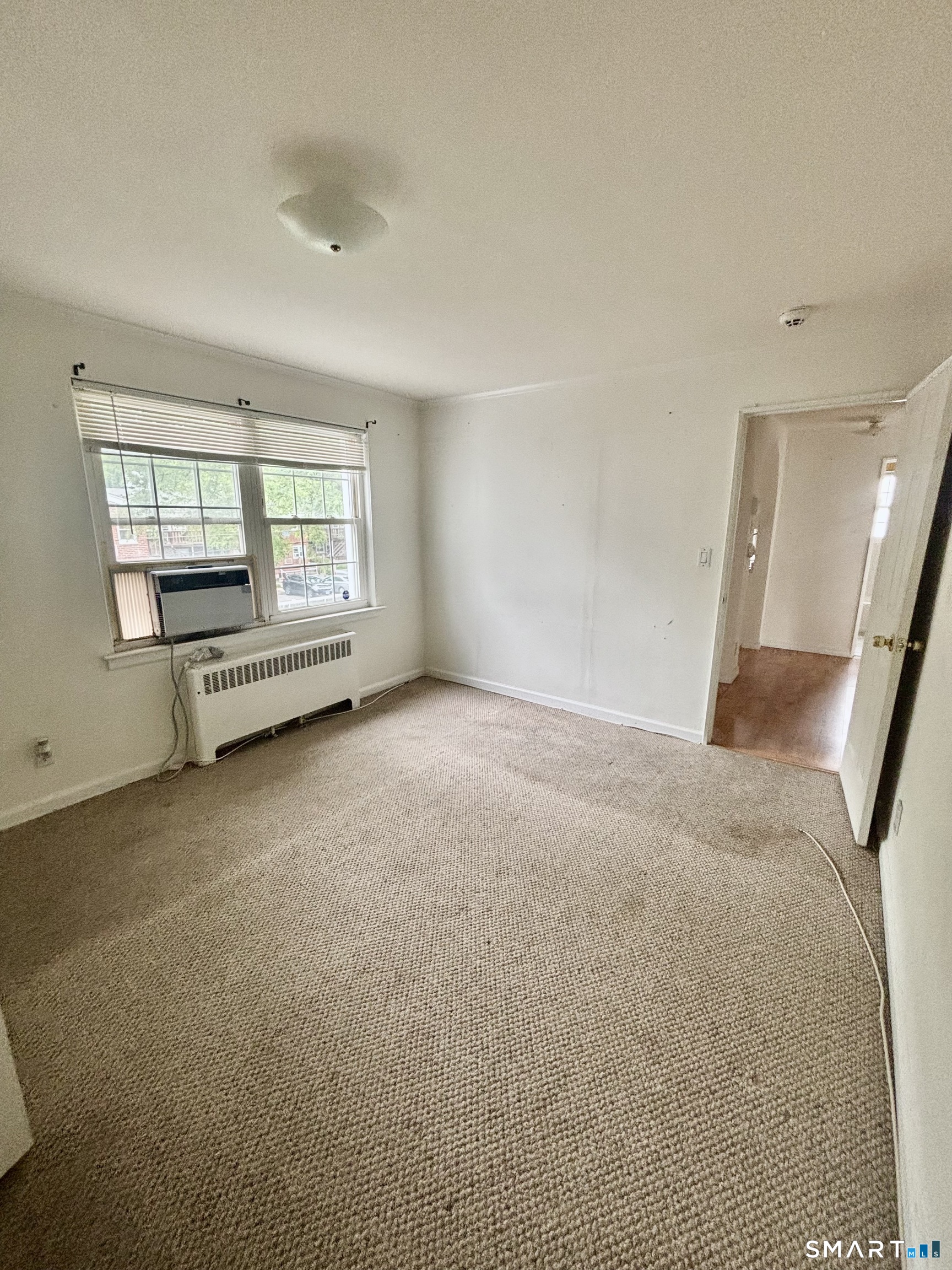 74 Standish Road, Unit 3 Stamford, CT 06902 - Photo 16 of 22 an empty room with windows