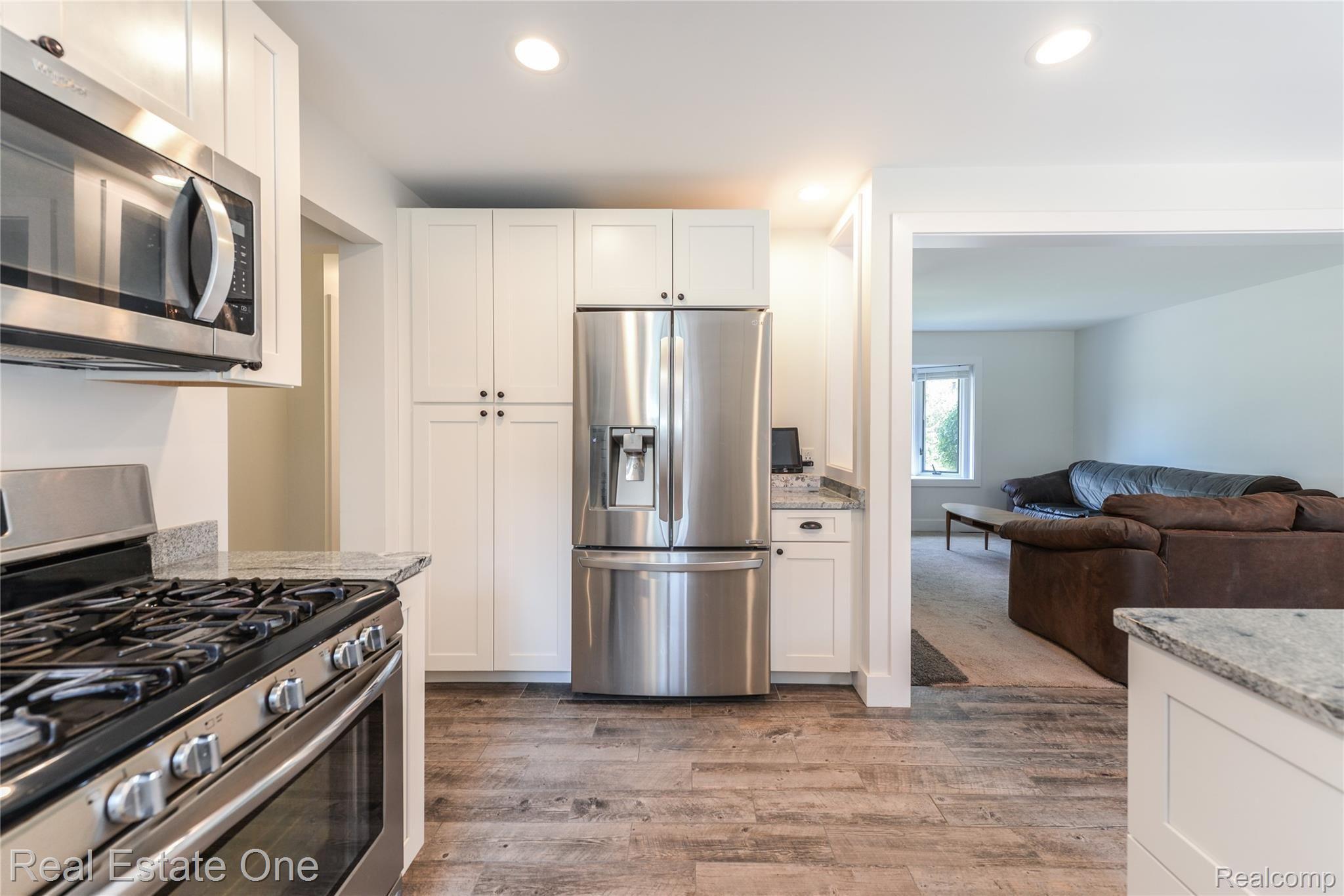 3007 Shewbird Road Wixom, MI 48393 - Photo 11 of 48 More cabinets and pantry