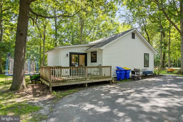 a view of deck with wooden floor and fence