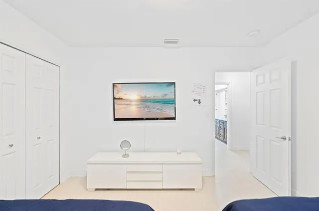 a bathroom with a sink a mirror and a bathtub