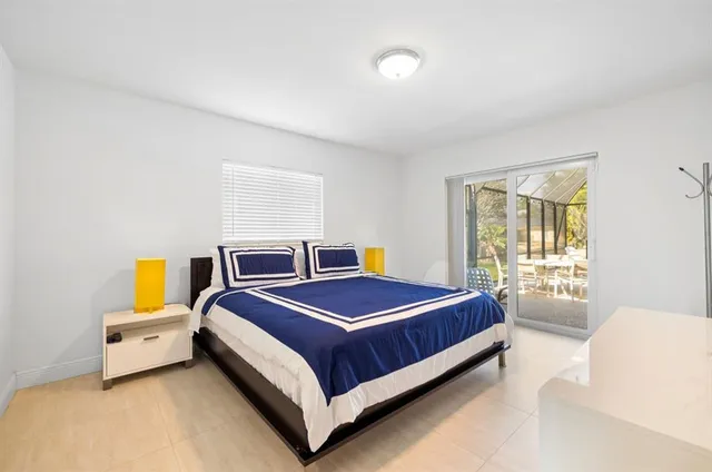 a bed room with a bed and a couch