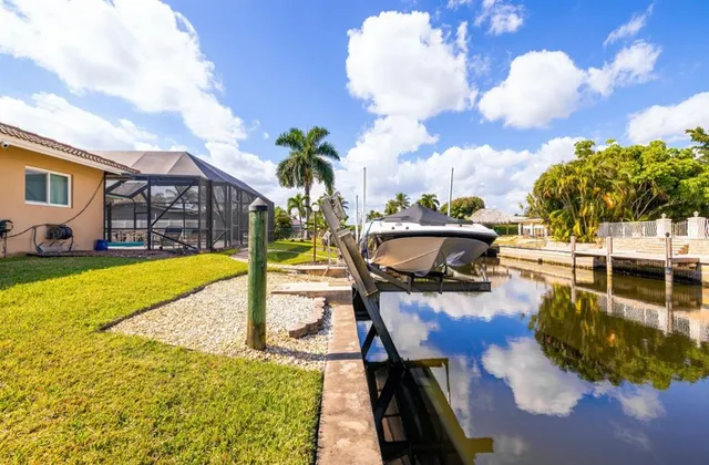 a view of a swimming pool with a patio