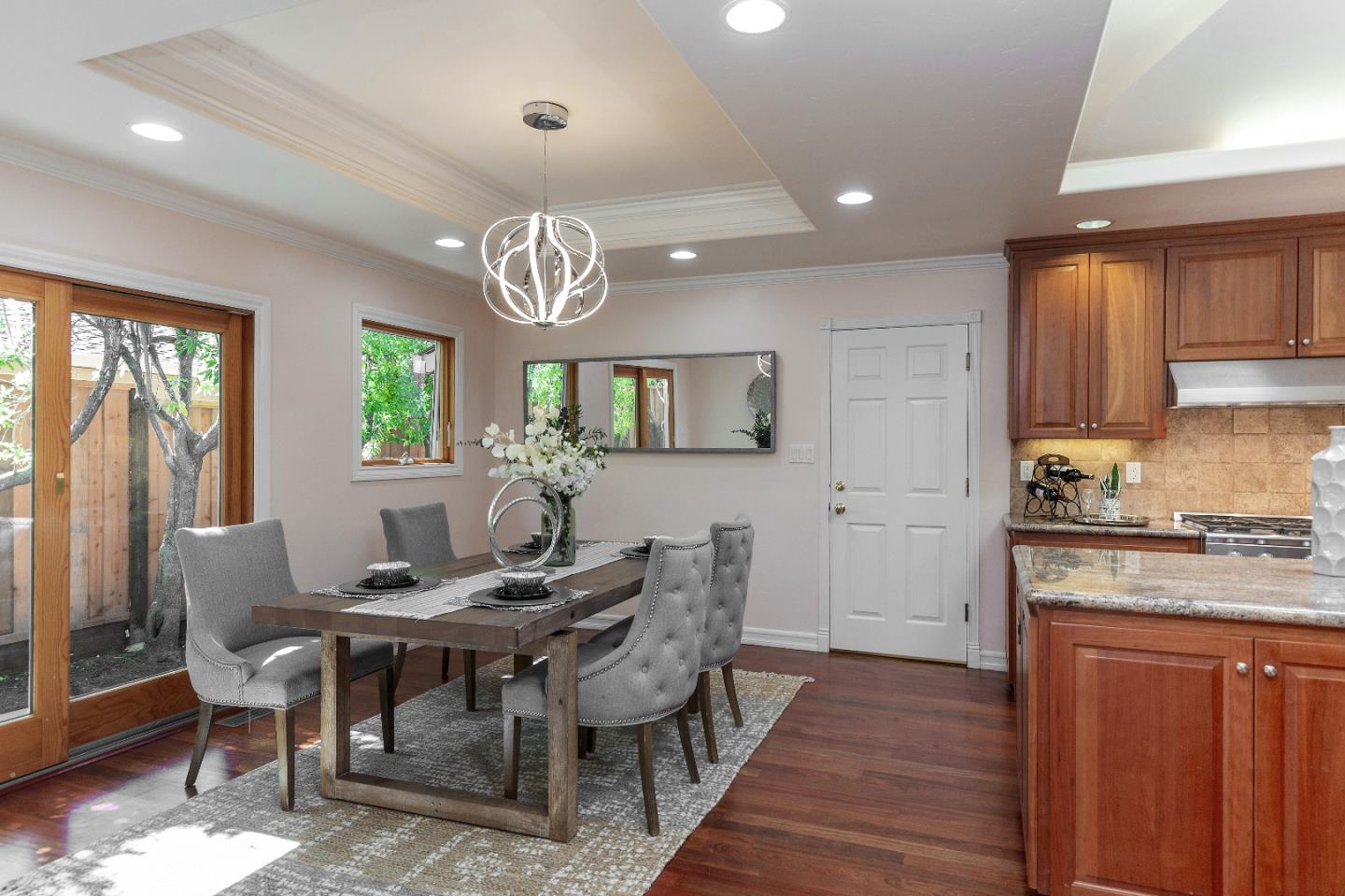 14920 Jerries Drive Saratoga, CA 95070 - Photo 14 of 34 a view of a dining room with furniture window and wooden floor