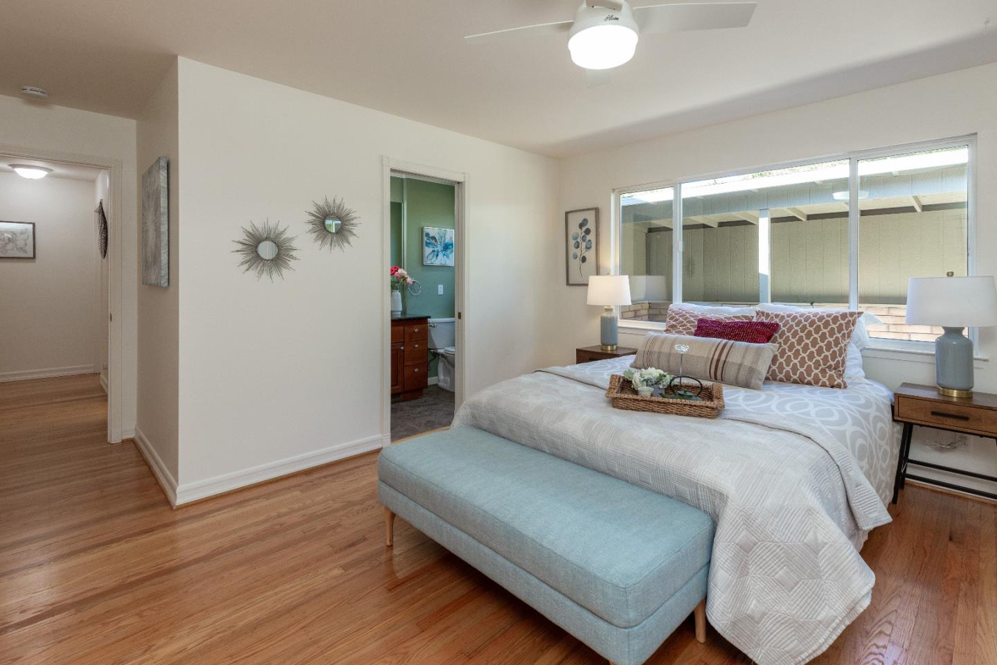 14920 Jerries Drive Saratoga, CA 95070 - Photo 16 of 34 a bedroom with a bed and wooden floor