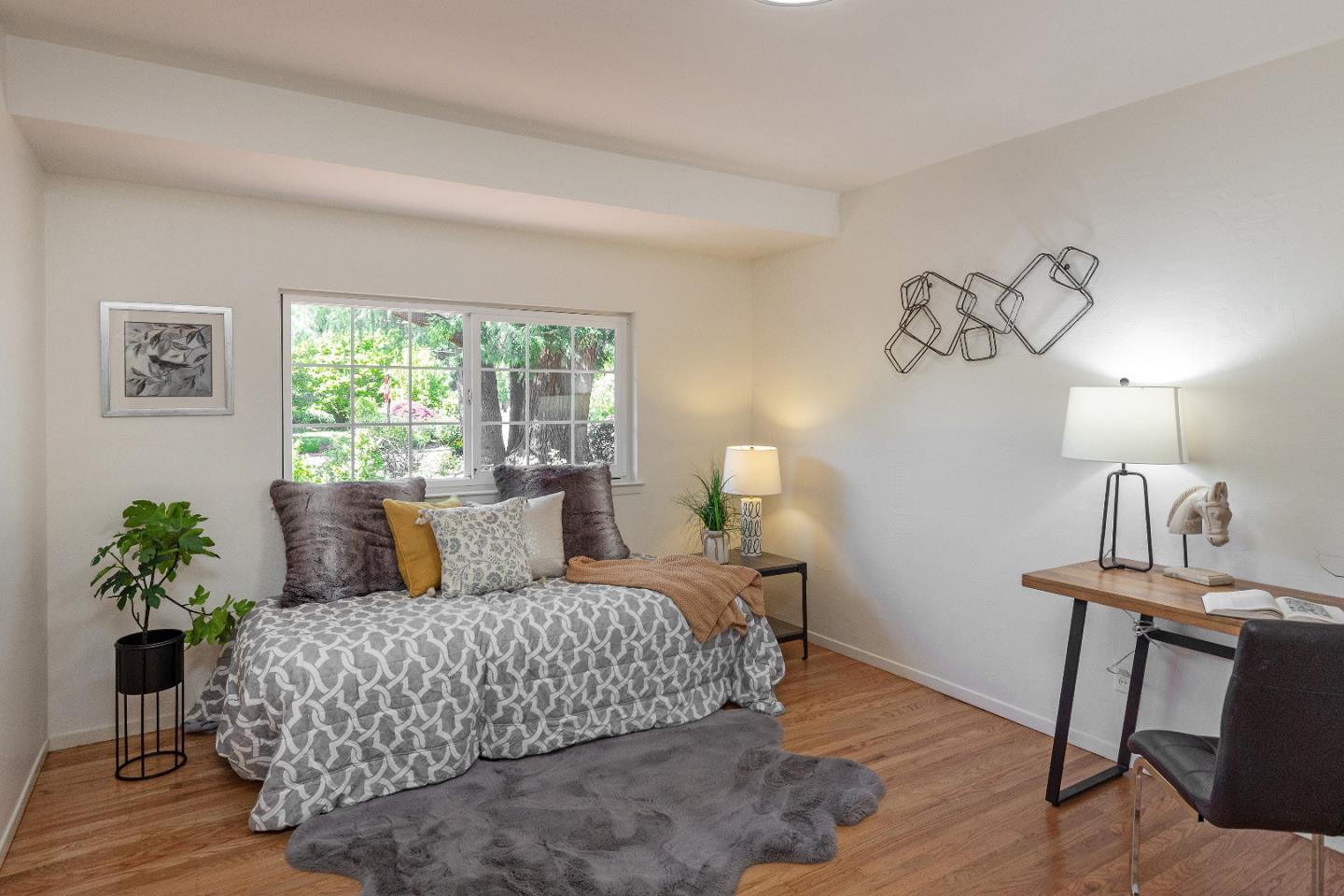 14920 Jerries Drive Saratoga, CA 95070 - Photo 17 of 34 a bedroom with a bed and window