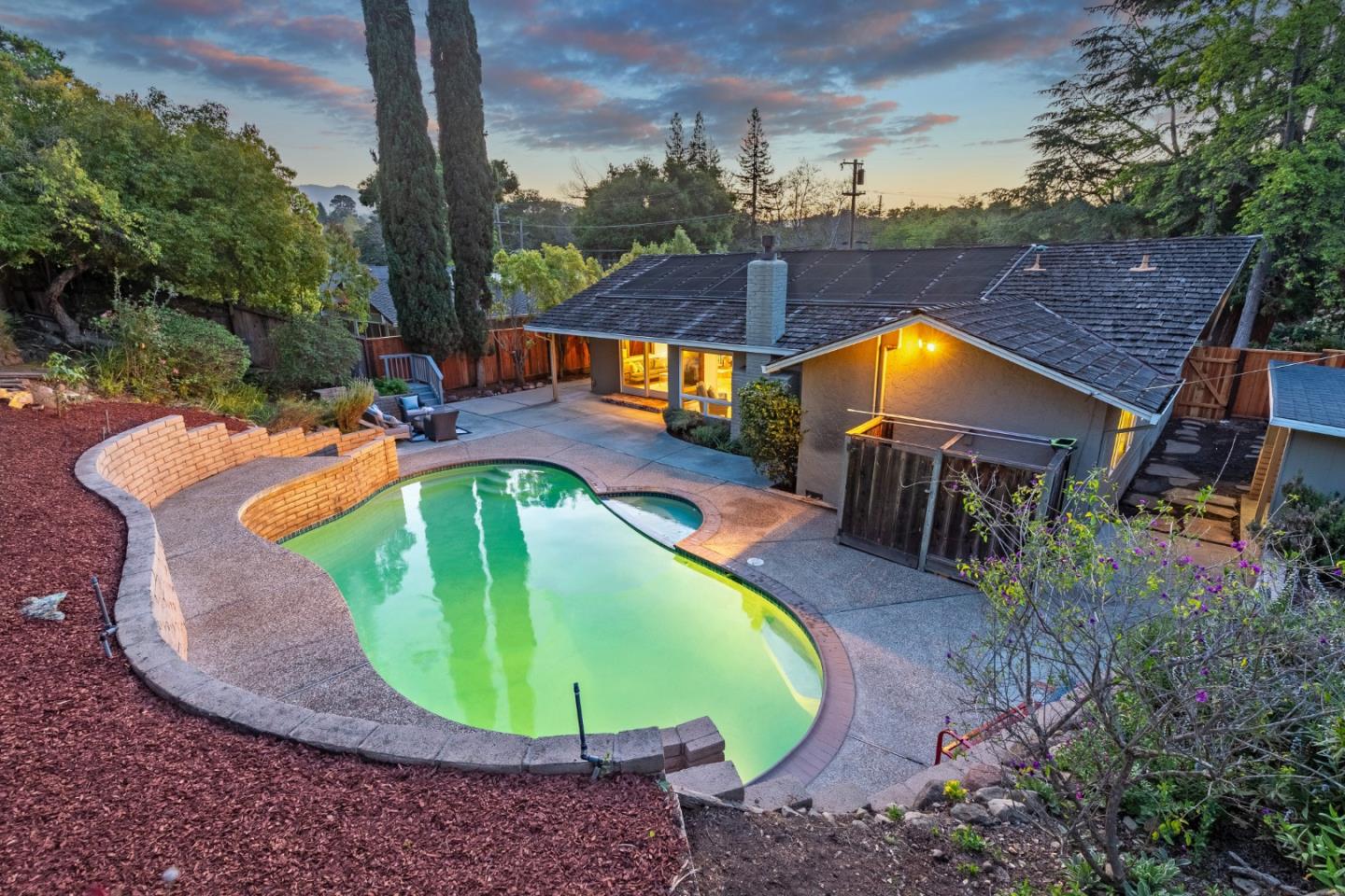 14920 Jerries Drive Saratoga, CA 95070 - Photo 23 of 34 an aerial view of a house with a swimming pool