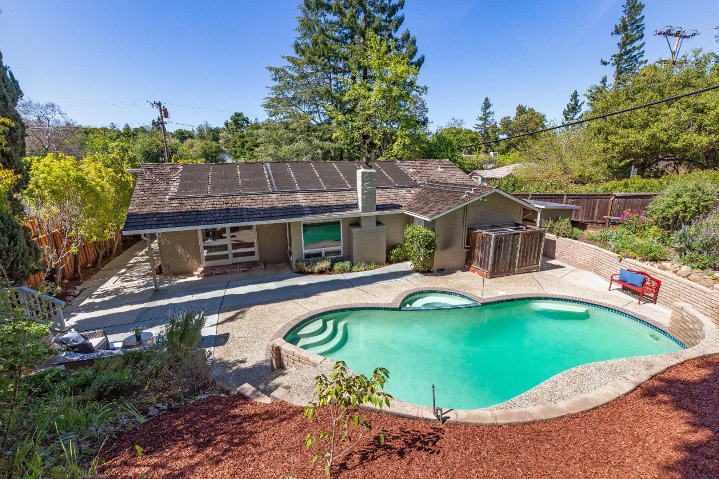 14920 Jerries Drive Saratoga, CA 95070 - Photo 25 of 34 a view of a house with swimming pool