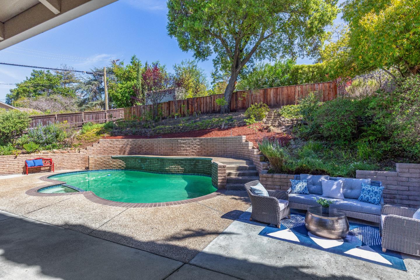 14920 Jerries Drive Saratoga, CA 95070 - Photo 28 of 34 a view of a backyard with sitting area