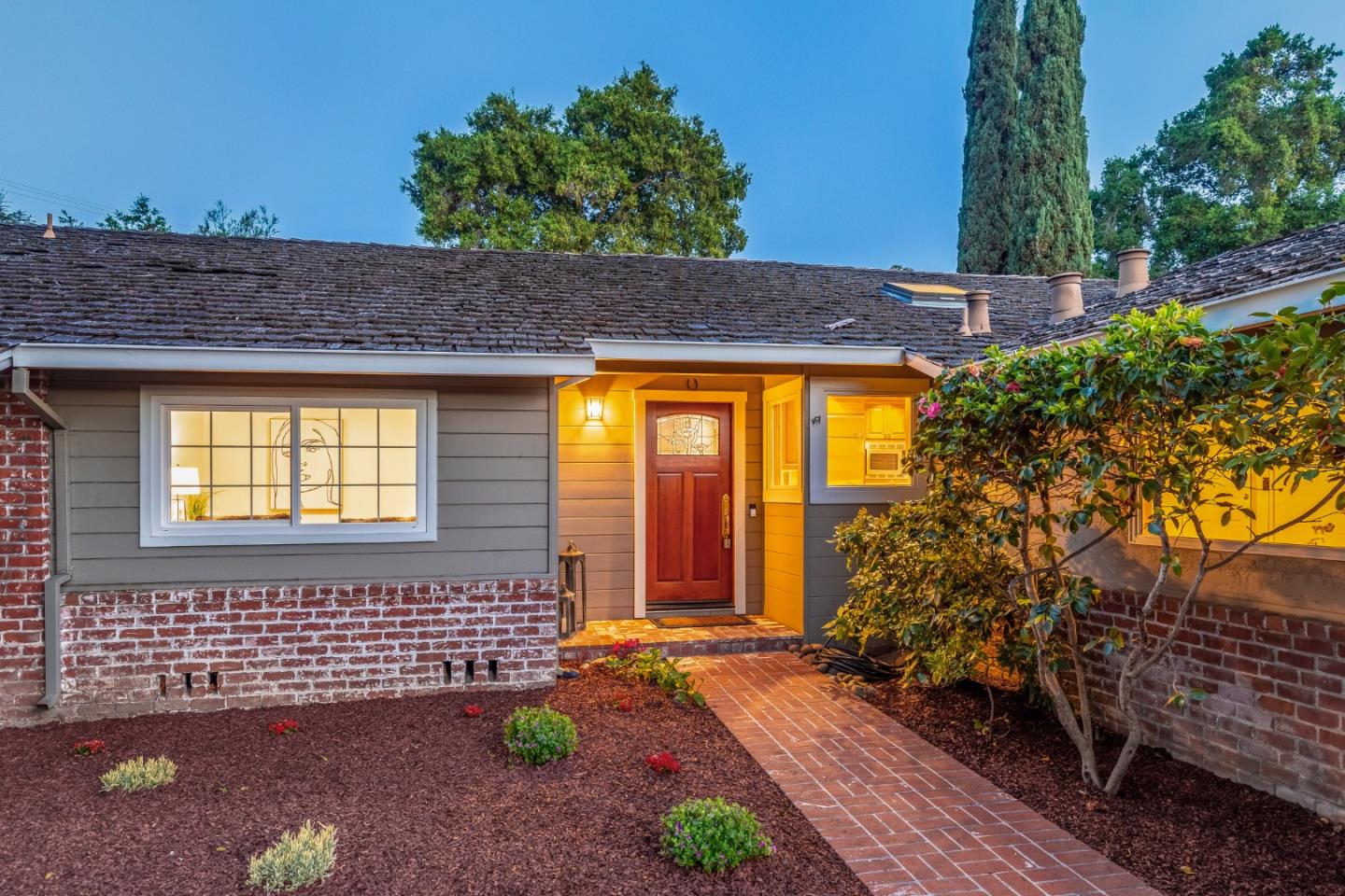 14920 Jerries Drive Saratoga, CA 95070 - Photo 3 of 34 a front view of a house with a yard