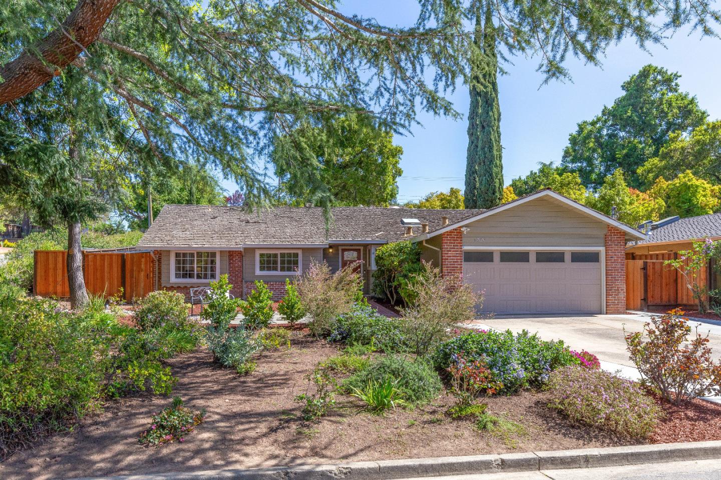 14920 Jerries Drive Saratoga, CA 95070 - Photo 4 of 34 a front view of house with yard and trees
