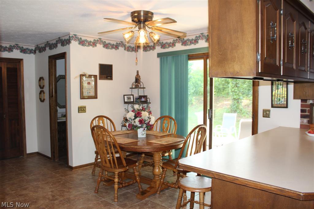 1815 Spring Valley Avenue Northwest Canton, OH 44708 - Photo 5 of 24 The kitchen opens to the dinette which has a slider to a patio.