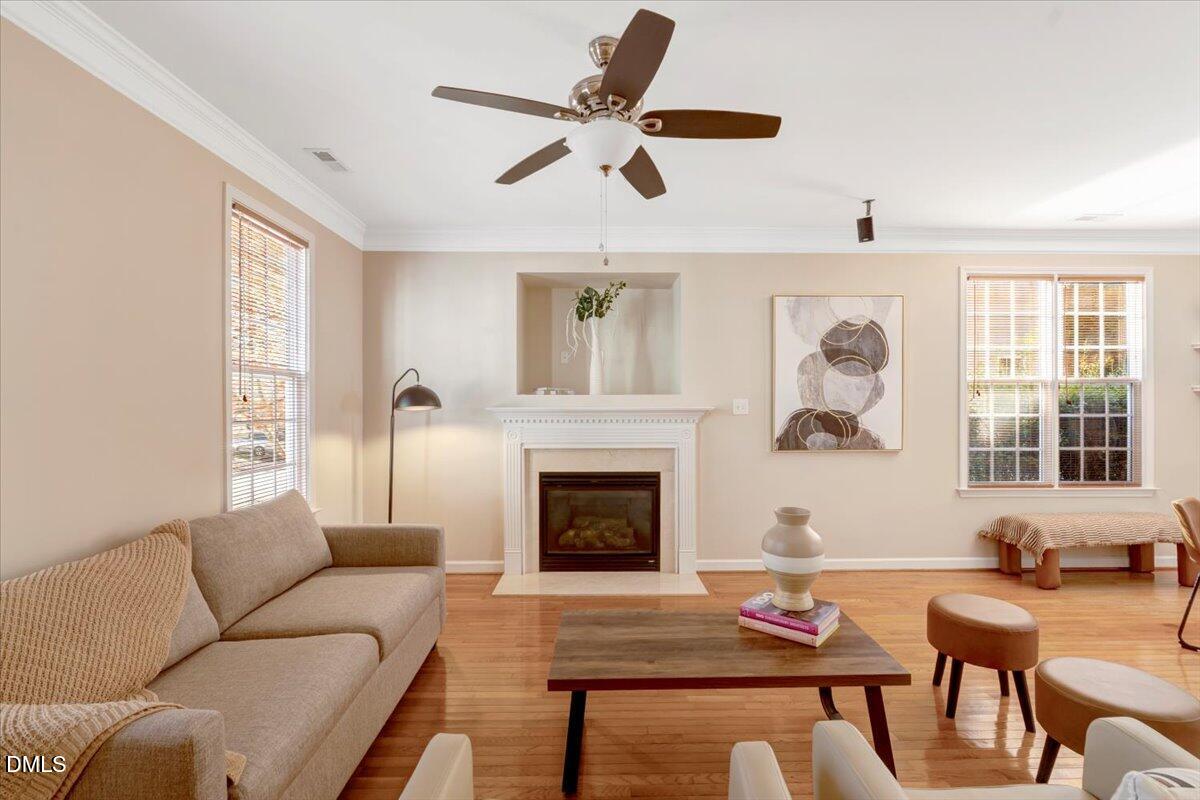 6021 Four Townes Lane Raleigh, NC 27616 - Photo 12 of 49 a living room with furniture and a fireplace