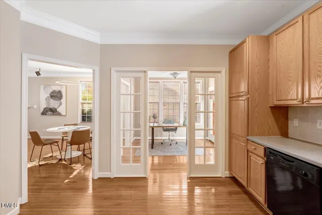 a view of a living room with hardwood floor