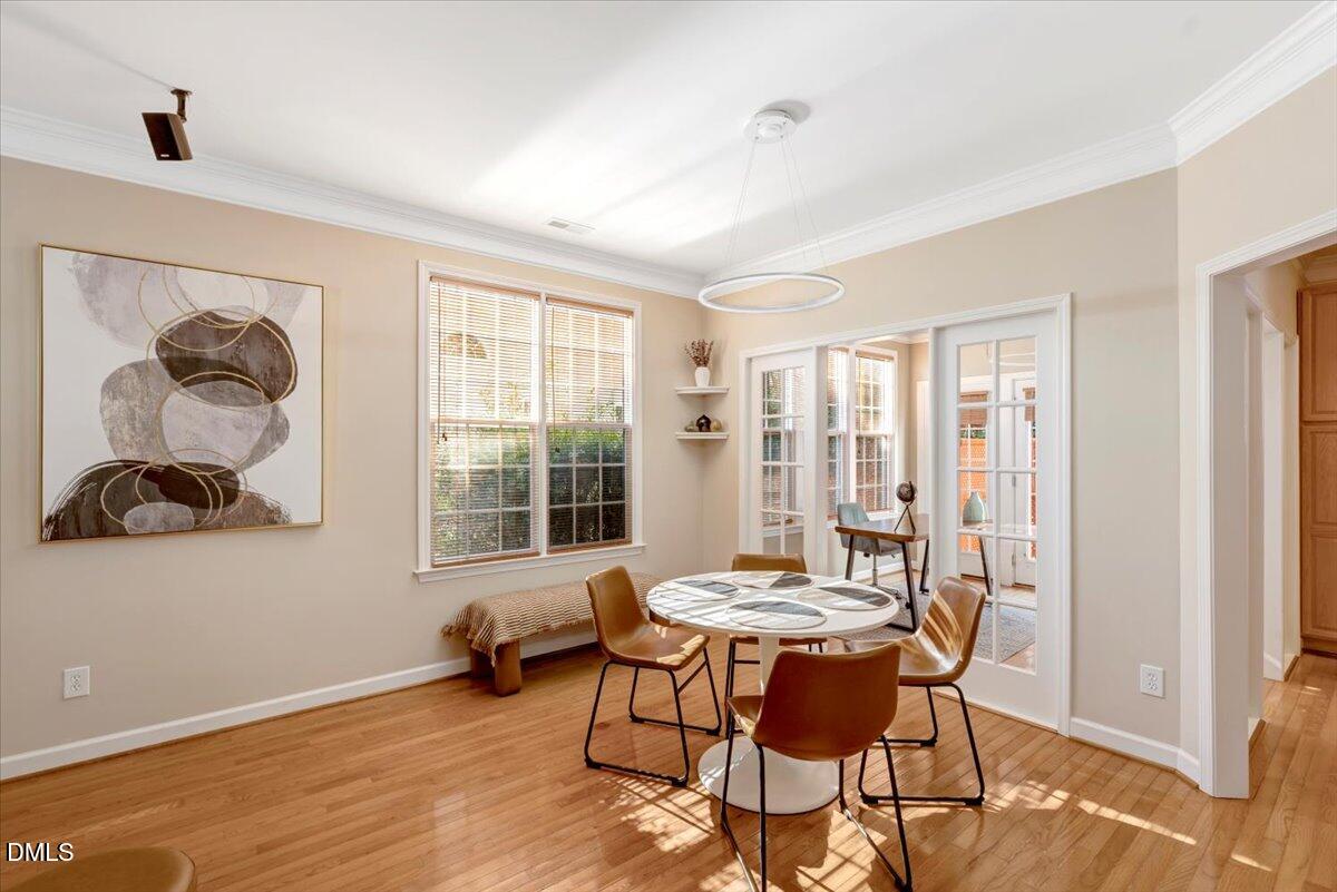 6021 Four Townes Lane Raleigh, NC 27616 - Photo 16 of 49 a dining room with furniture and window
