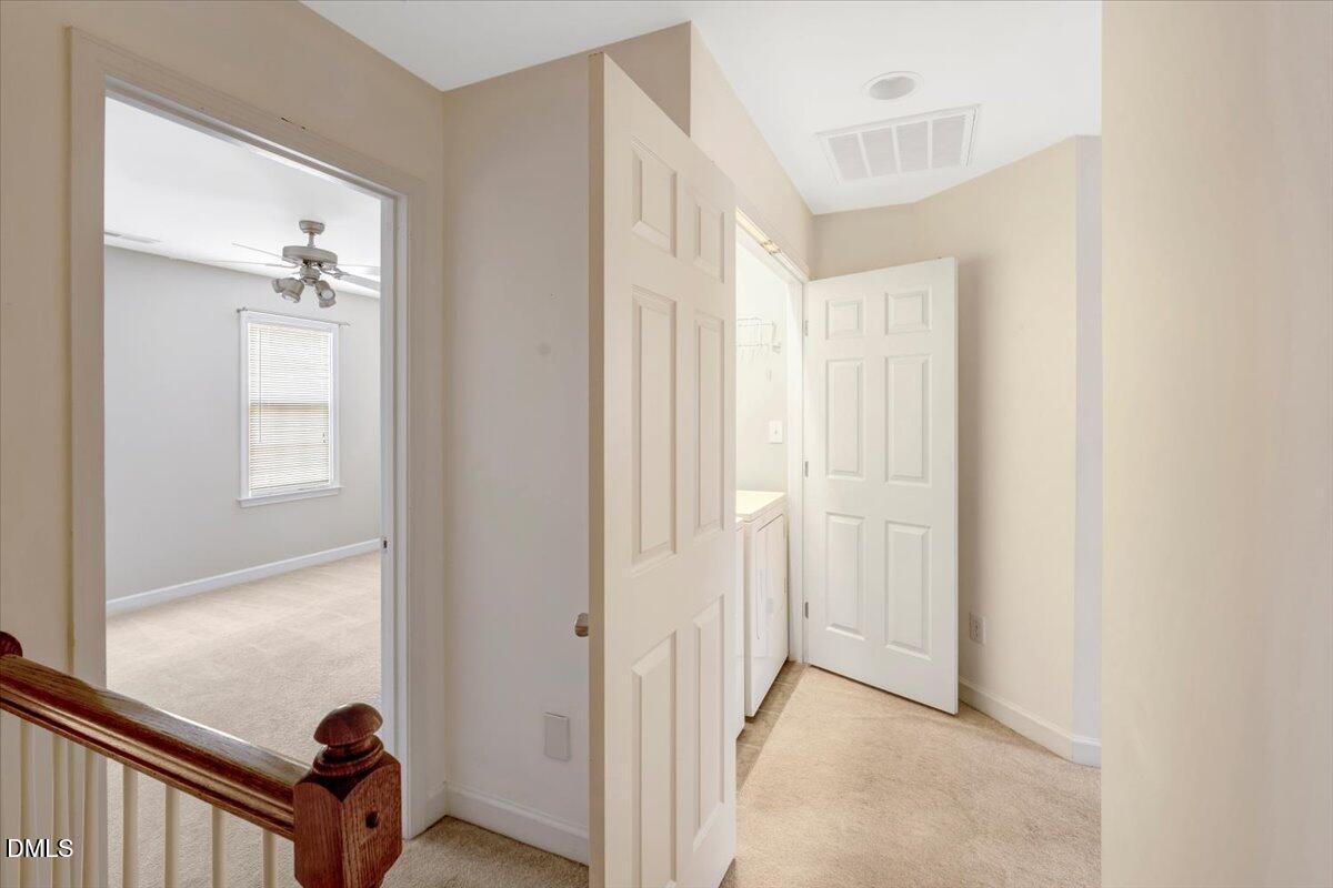 6021 Four Townes Lane Raleigh, NC 27616 - Photo 20 of 22 a view of a hallway view with staircase