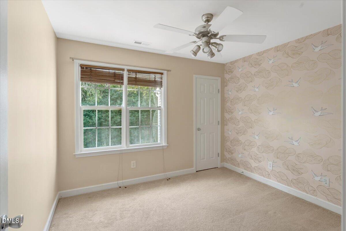 6021 Four Townes Lane Raleigh, NC 27616 - Photo 30 of 49 an empty room with a window