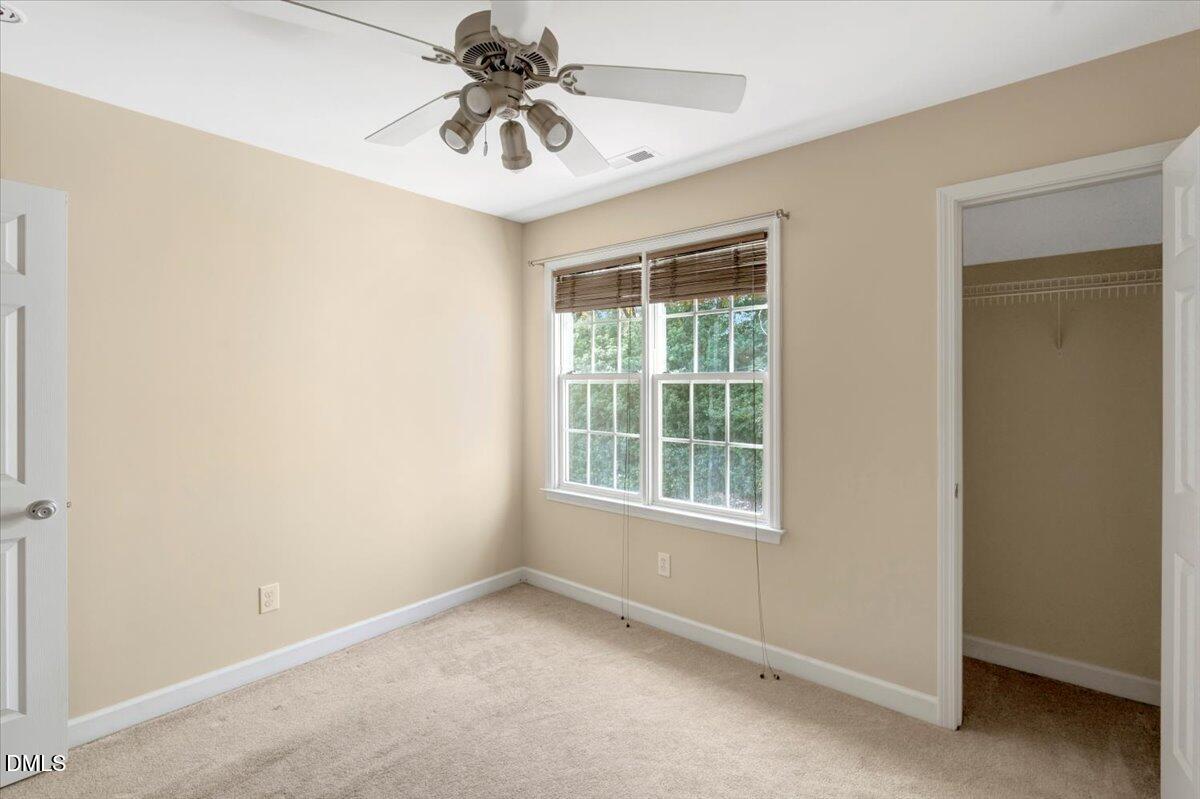 6021 Four Townes Lane Raleigh, NC 27616 - Photo 33 of 49 an empty room with a window