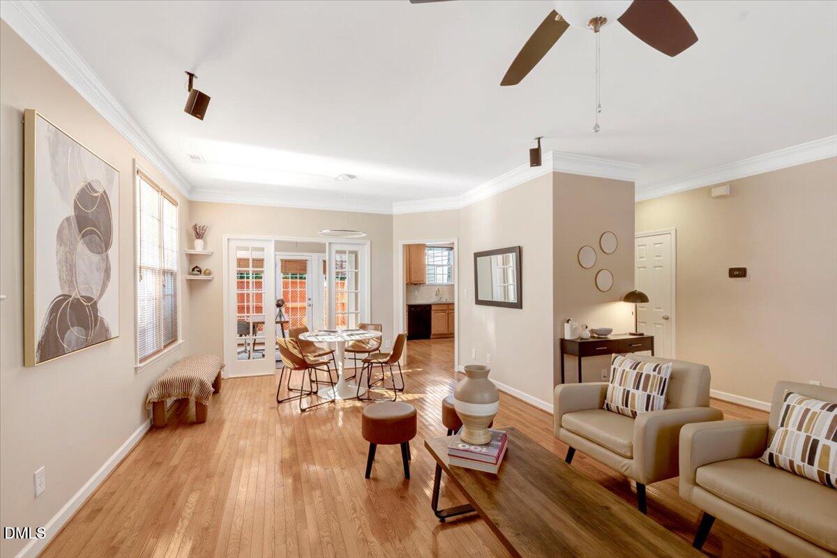 6021 Four Townes Lane Raleigh, NC 27616 - Photo 4 of 22 a living room with furniture and wooden floor