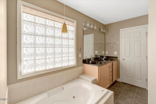 a bathroom with a sink and a bathtub