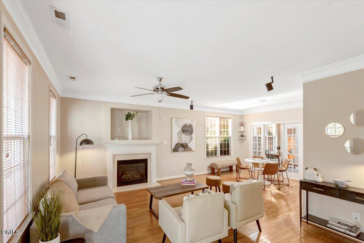 6021 Four Townes Lane Raleigh, NC 27616 - Photo 7 of 49 a living room with furniture fireplace and window