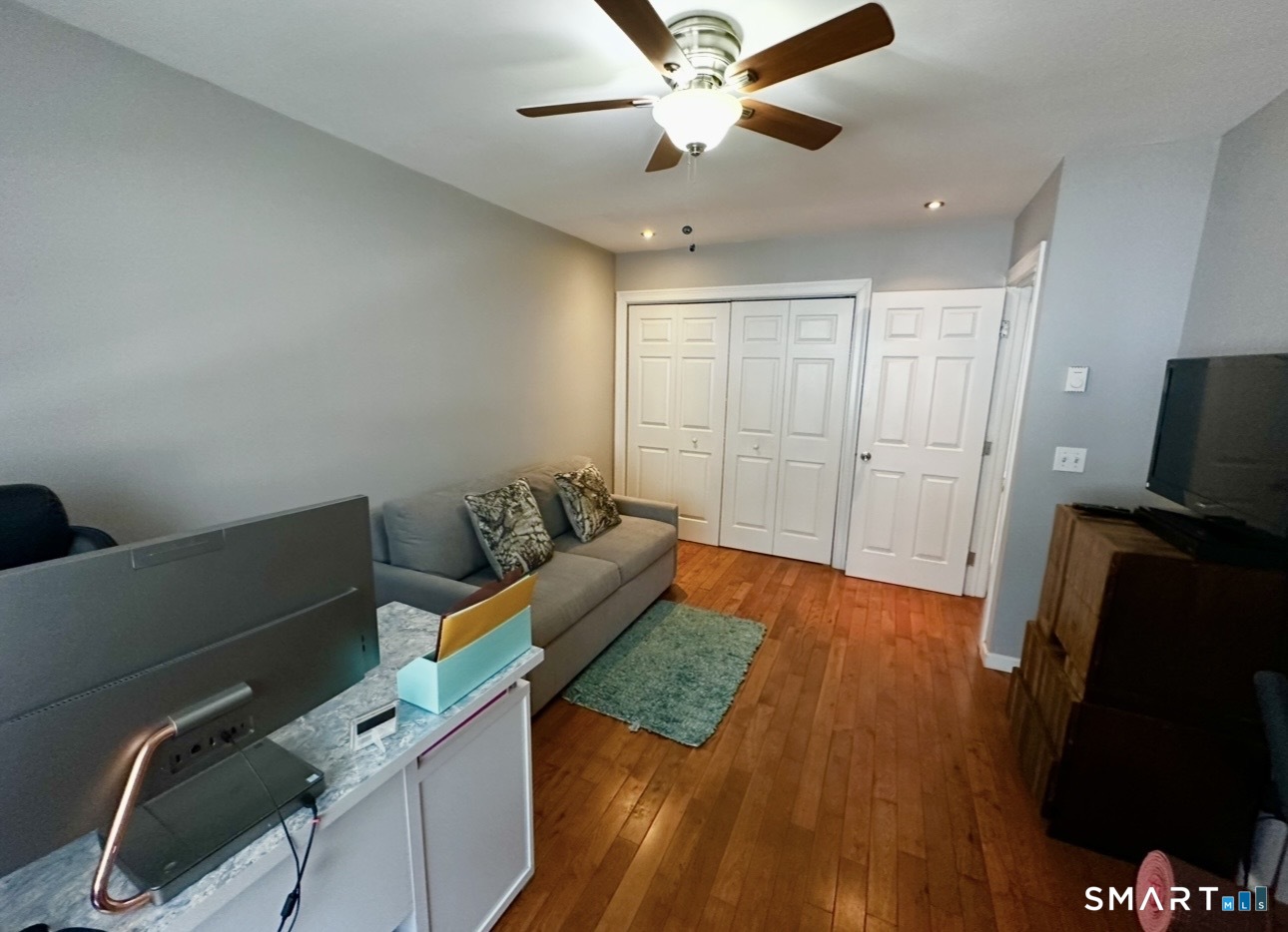 519 Scott Road, Unit 58 Waterbury, CT 06705 - Photo 14 of 19 a bed room with a bed and a television