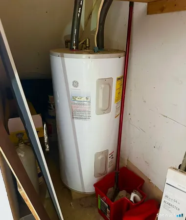 a view of storage and utility room