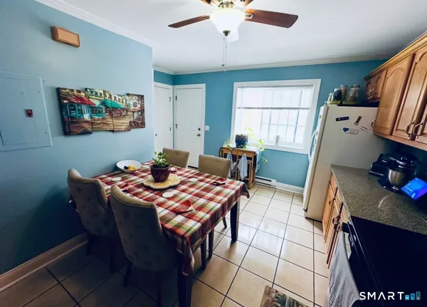 a view of a dining room with furniture