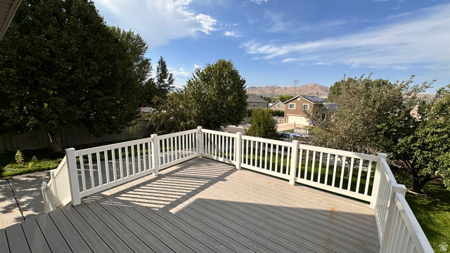 3547 East Golden Eagle Road Eagle Mountain, UT 84005 - Photo 42 of 47 Wooden deck featuring a residential view and a mountain view