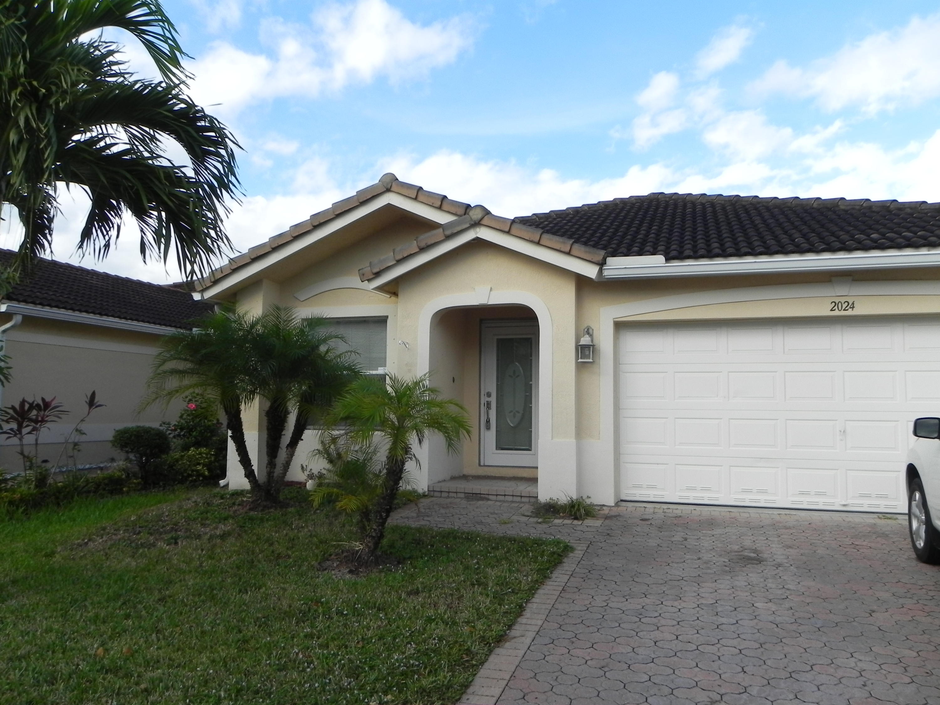 2024 Little Torch Street Riviera Beach, FL 33407 - Photo 1 of 12 Exterior Front