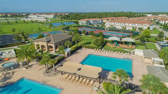 an aerial view of a house with a garden