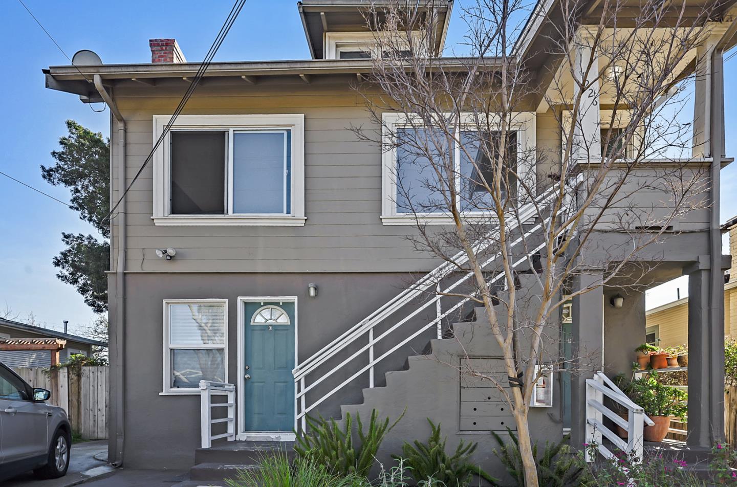 a view of a building with a tree