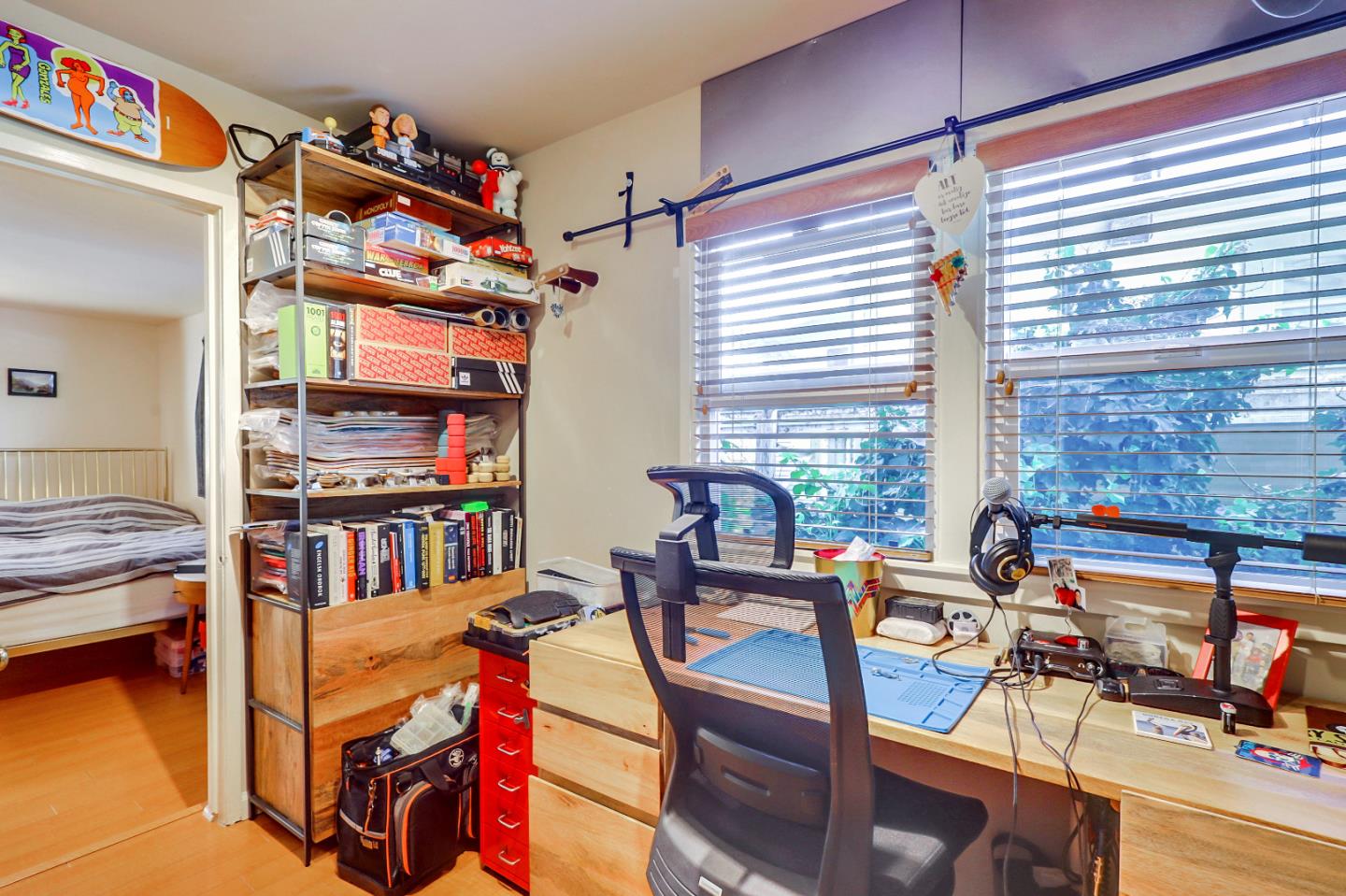 1226 Russell Street Berkeley, CA 94702 - Photo 19 of 38 a reading room with furniture book shelf and a window