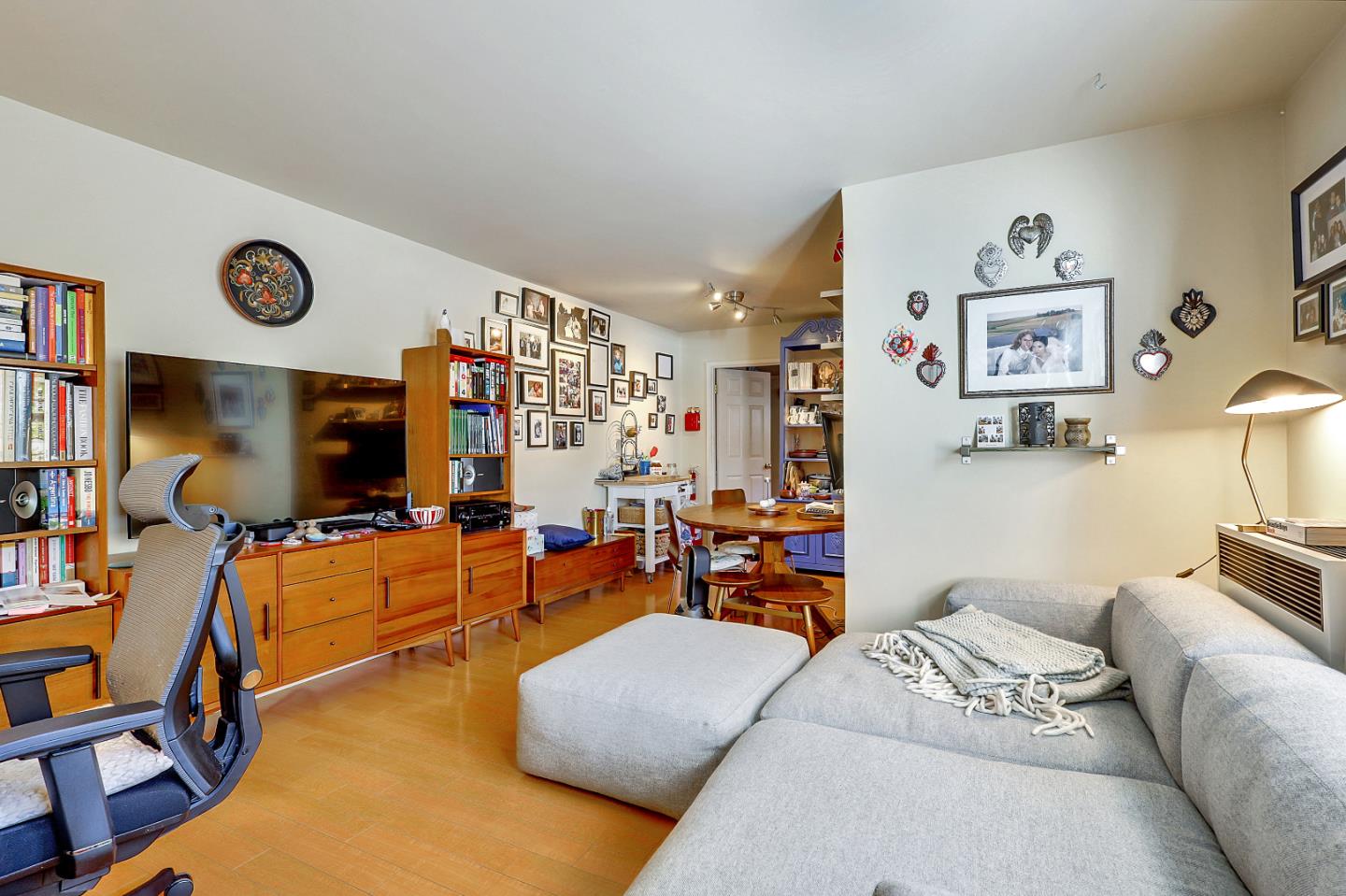 1226 Russell Street Berkeley, CA 94702 - Photo 3 of 38 a living room with furniture and a flat screen tv