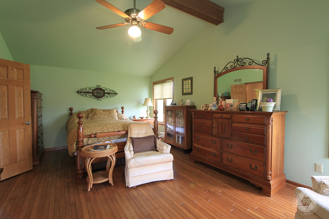 4900 Stockdale Road Morris, IL 60450 - Photo 18 of 33 a bed room with a bed and furniture