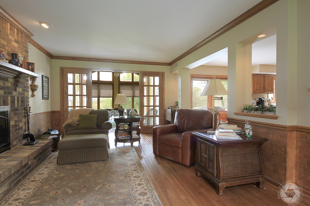 4900 Stockdale Road Morris, IL 60450 - Photo 7 of 33 a living room with furniture and a fireplace
