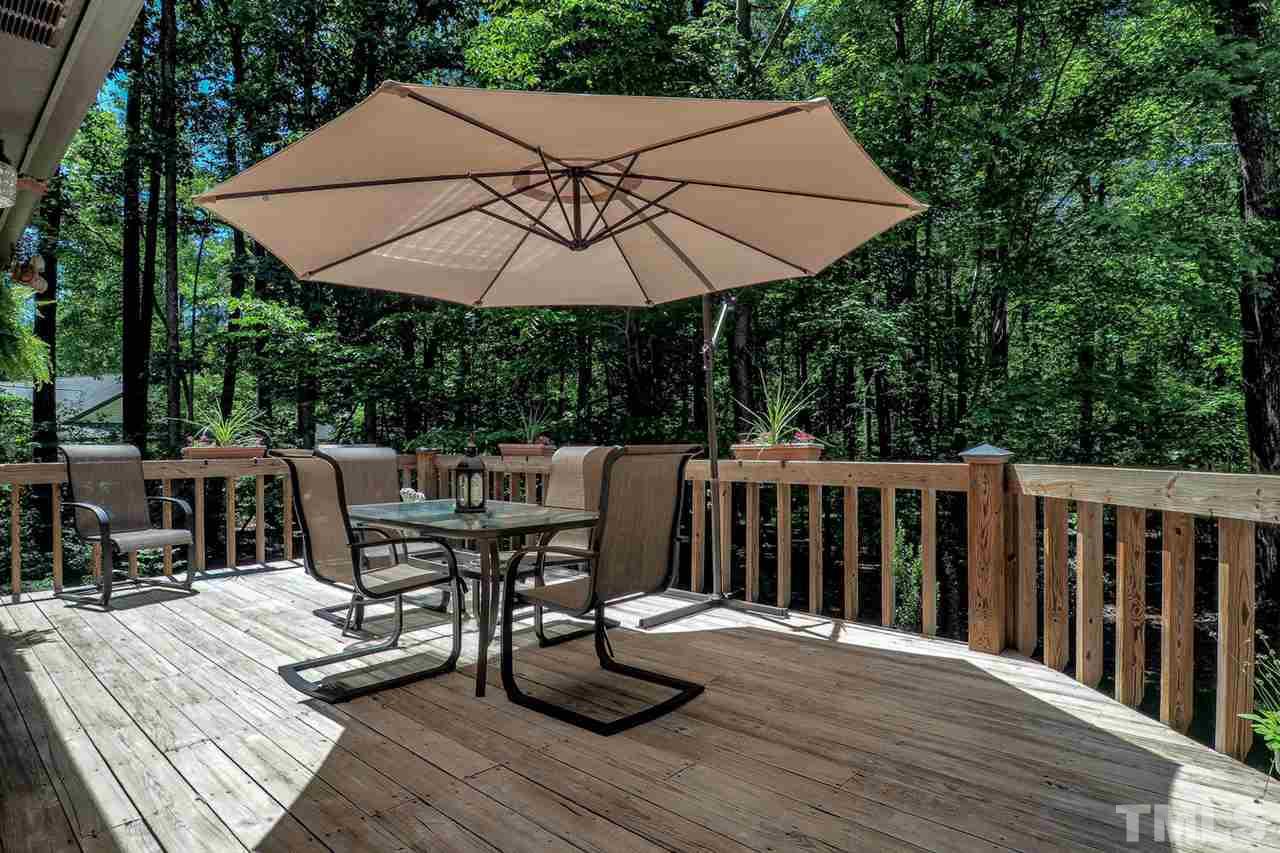 5009 Field And Stream Road Raleigh, NC 27613 - Photo 12 of 12 Backyard is a OASIS in the middle of the city with a NATURAL wood buffer giving you plenty of PRIVACY!