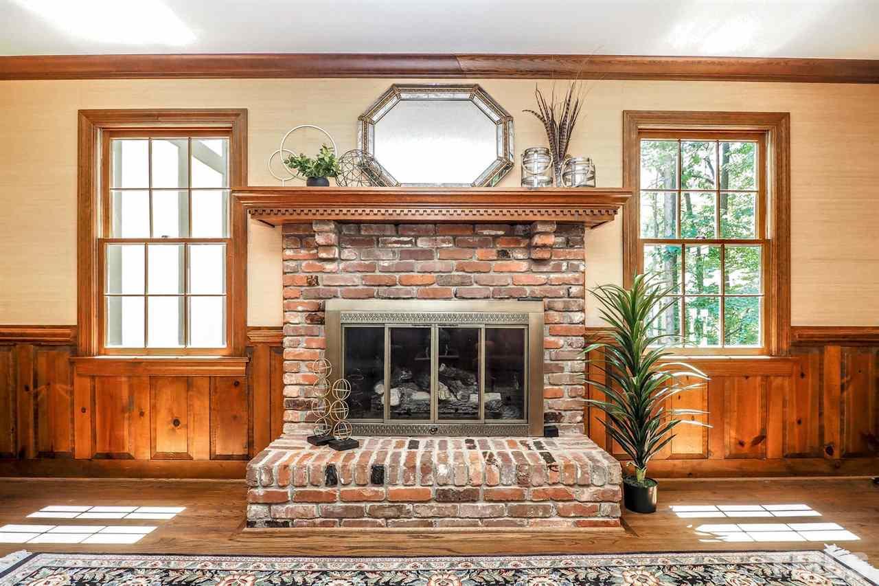 5009 Field And Stream Road Raleigh, NC 27613 - Photo 5 of 12 Beautiful 2nd FIREPLACE in family room.