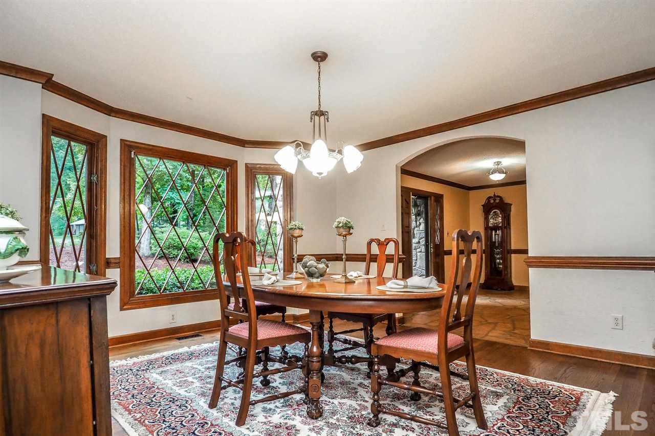 5009 Field And Stream Road Raleigh, NC 27613 - Photo 6 of 12 Freshly PAINTED dining room with a beautiful view!