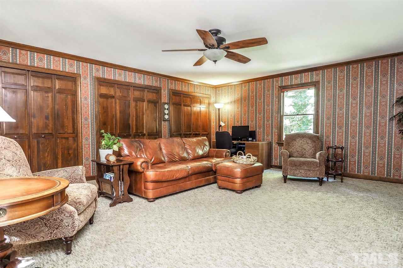 5009 Field And Stream Road Raleigh, NC 27613 - Photo 7 of 12 Huge BONUS room on the MAIN floor!! A TON of extra space with many POSSIBILITIES!