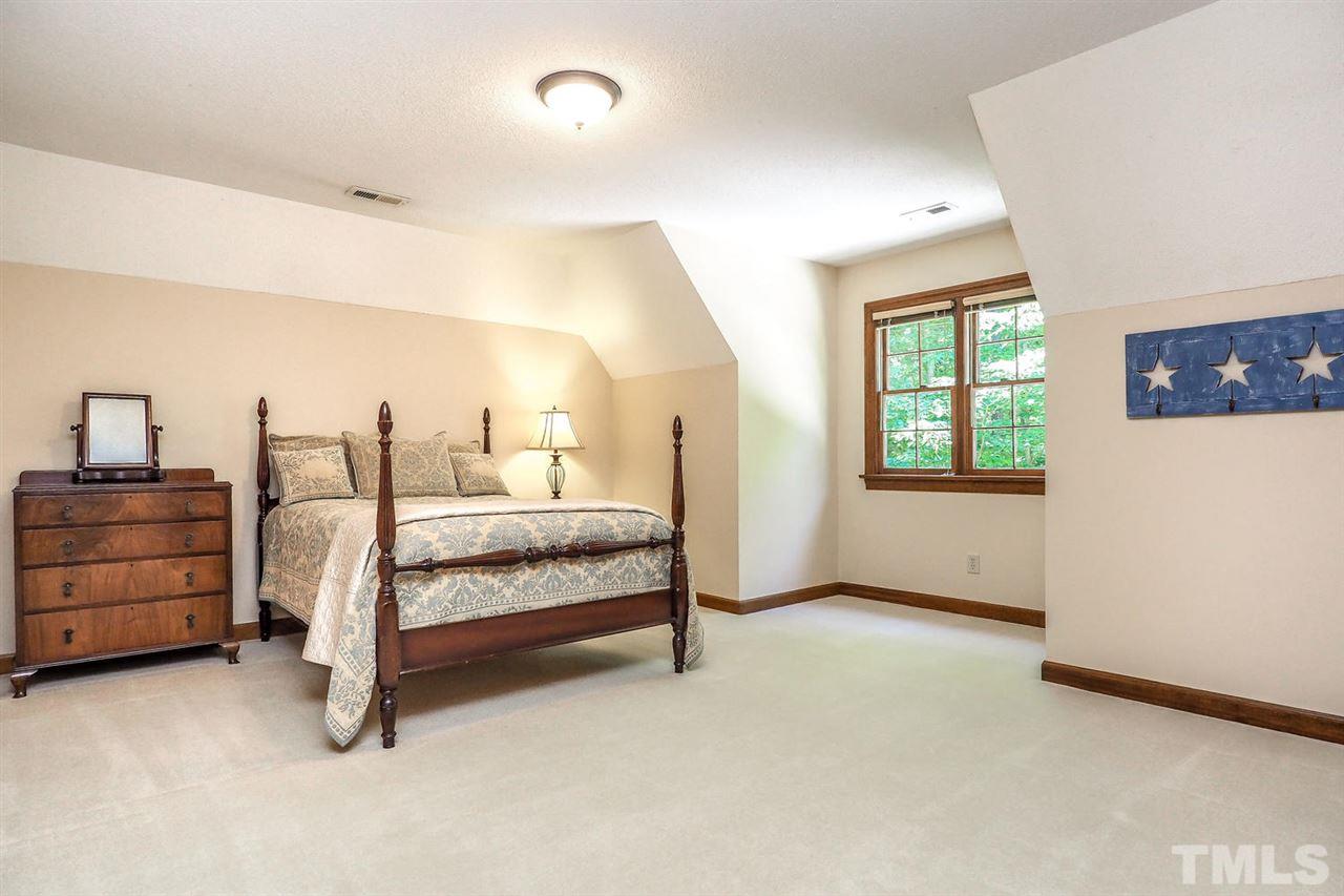 5009 Field And Stream Road Raleigh, NC 27613 - Photo 8 of 12 Secondary bedrooms has plenty of NATURAL light and space!