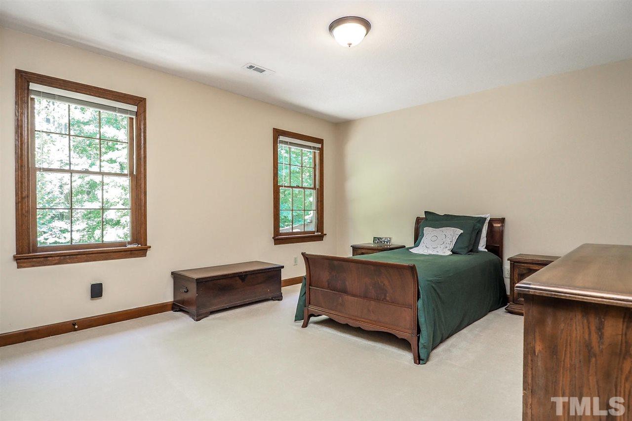 5009 Field And Stream Road Raleigh, NC 27613 - Photo 10 of 12 Secondary bedroom has plenty of NATURAL light.